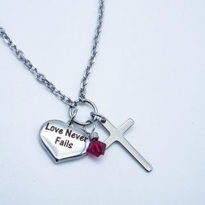 Cynthia Lynn "LOVE NEVER FAILS" Stainless Steel Christian Valentine Necklace